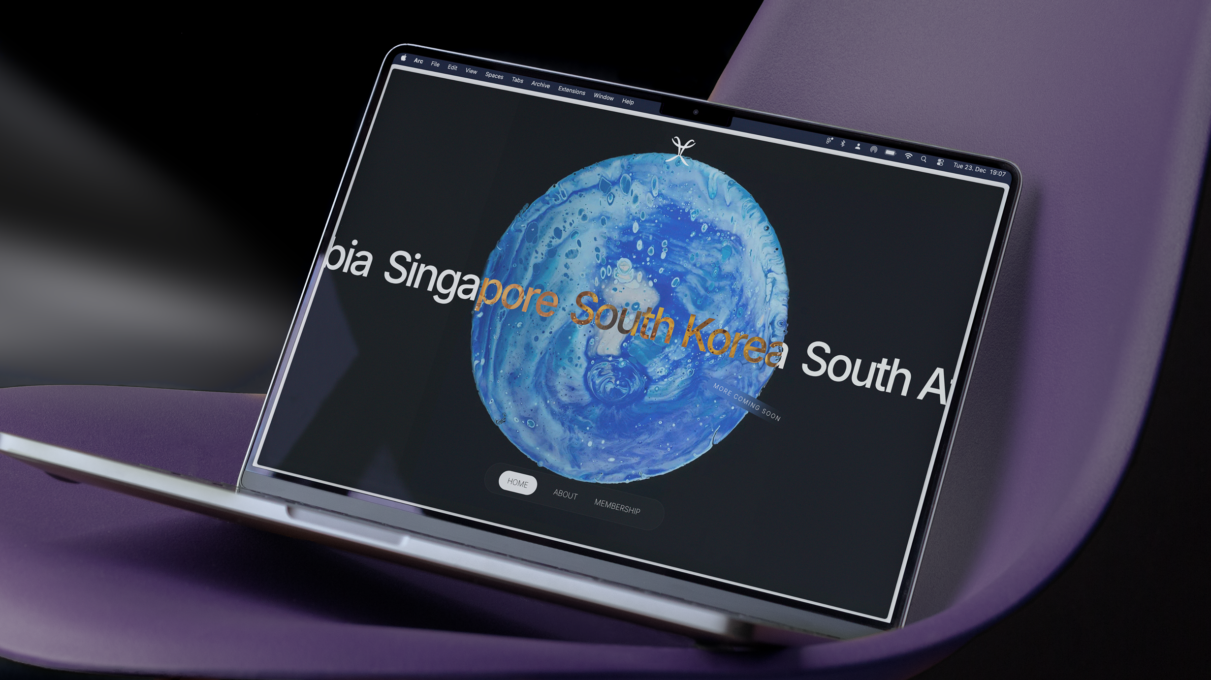 A laptop displaying the AEO website.