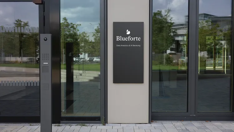 Blueforte company sign on the facade of an office building