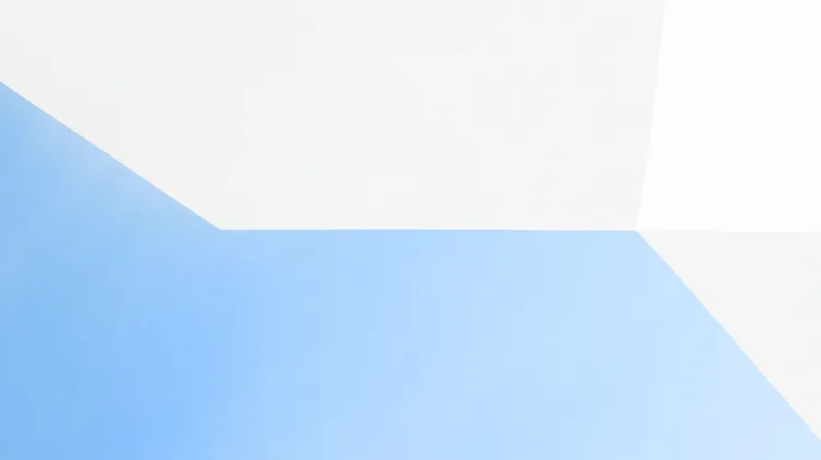 A minimal picture with light blue and grey color geometric fields showcasing the brand color of WIB Wendt Bauingenieure