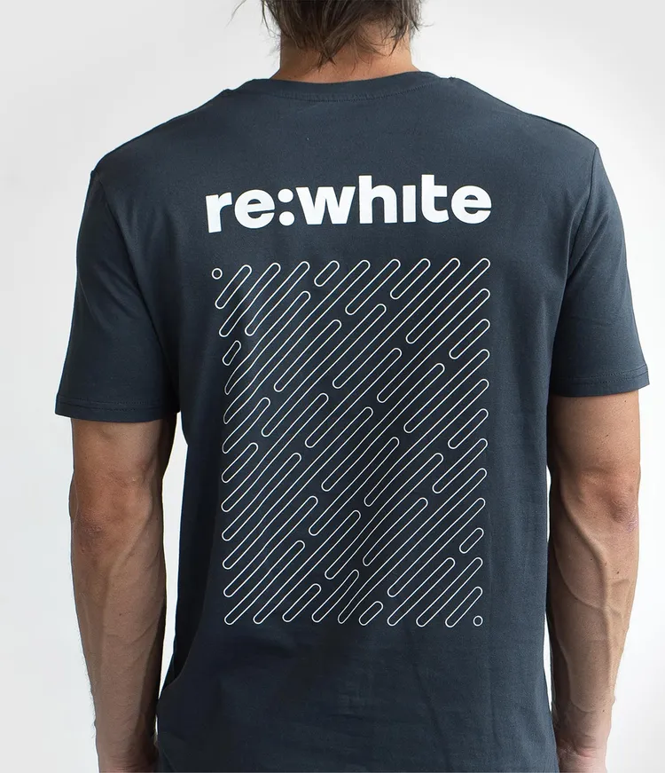 Rear view of a person wearing a black T-shirt with the white text 're:white' and a diagonal line pattern.
