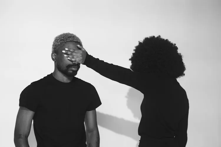 Unsplash image for diverse hands collaborating around accessible design tokens